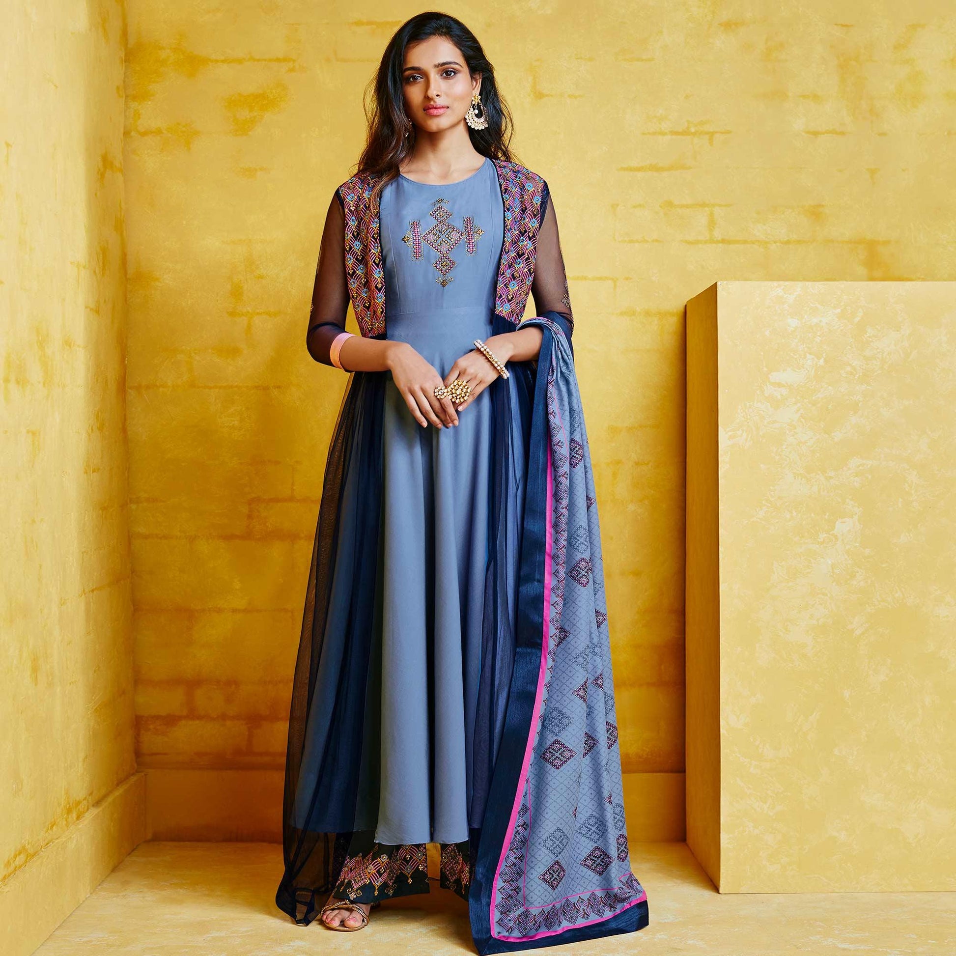 Imposing Blue Colored Partywear Embroidered Muslin Palazzo Suit