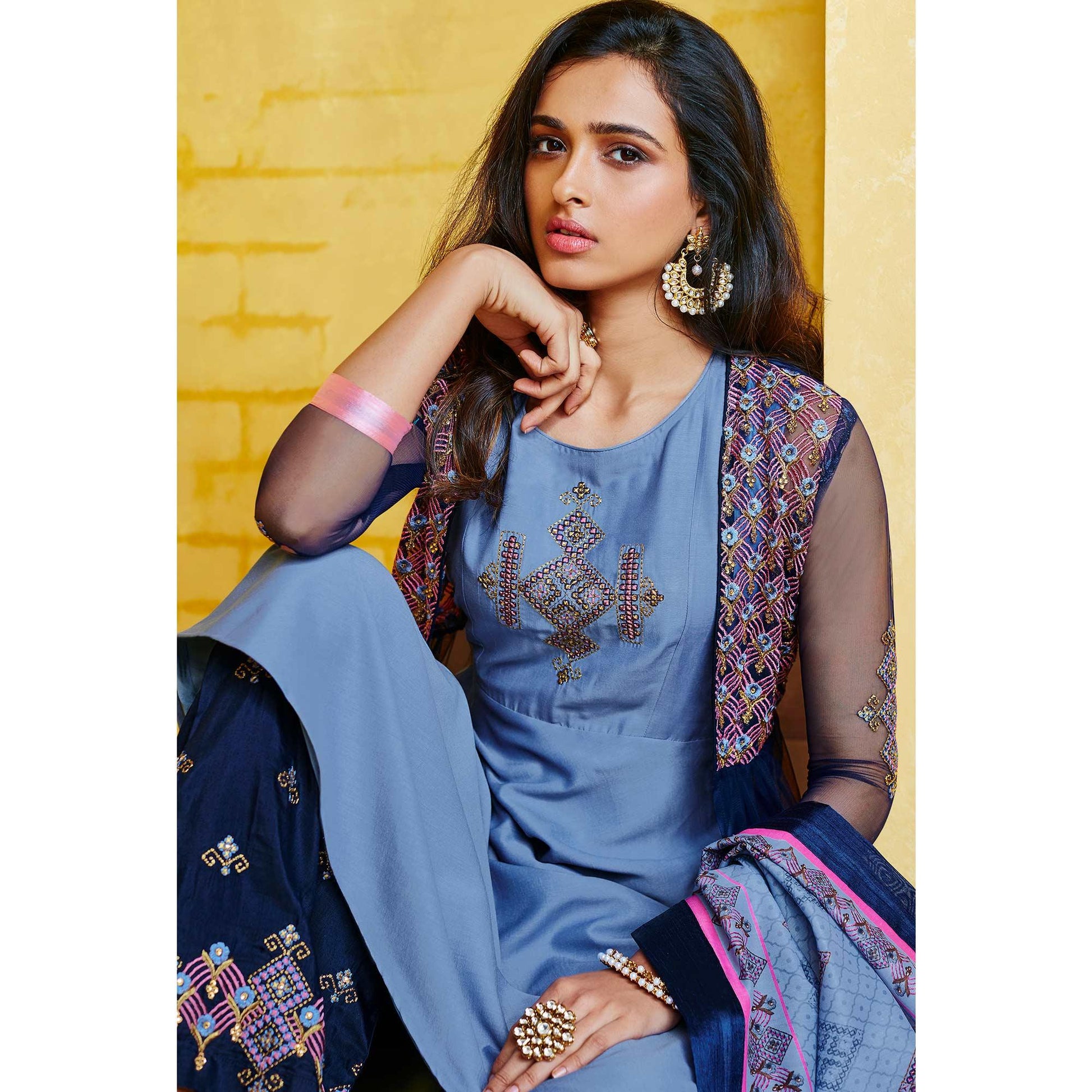 Imposing Blue Colored Partywear Embroidered Muslin Palazzo Suit