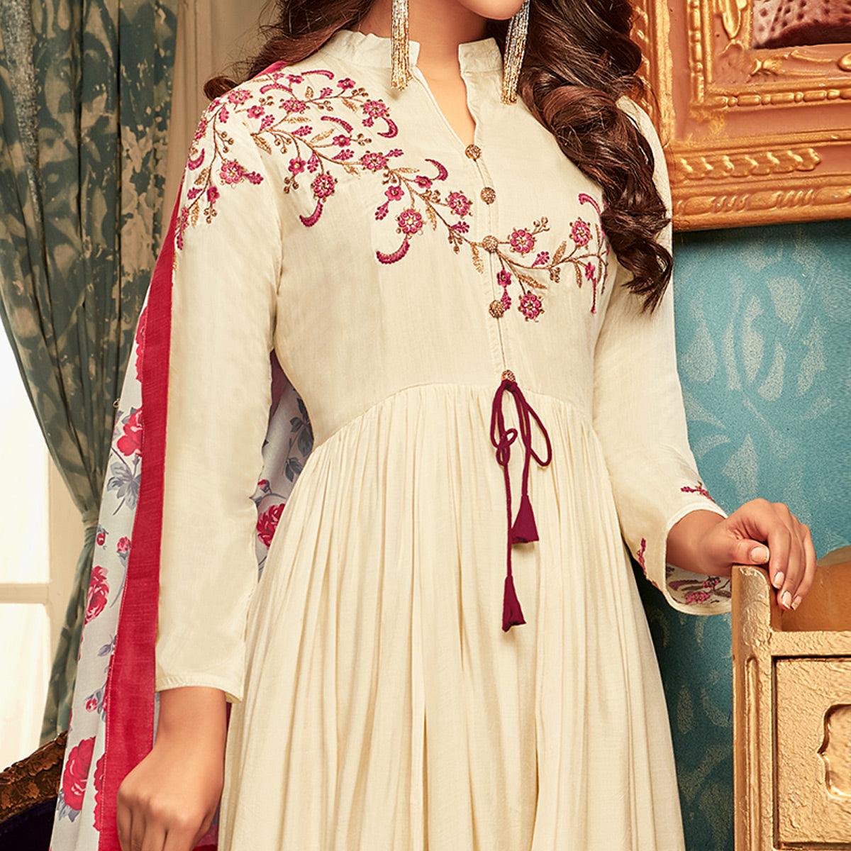 Imposing Cream Colored Partywear Embroidered Heavy Muslin Gown