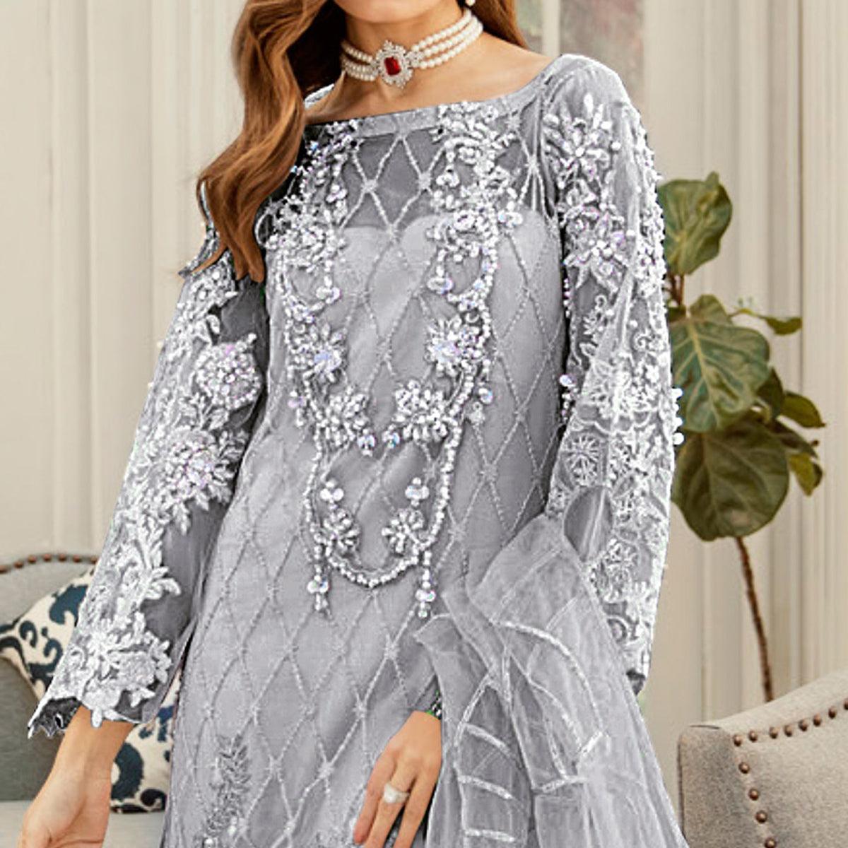 Imposing Grey Cololred Partywear Embroidered Net Palazzo Suit