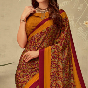 Imposing Maroon-Yellow Colored Partywear Printed Crepe Saree
