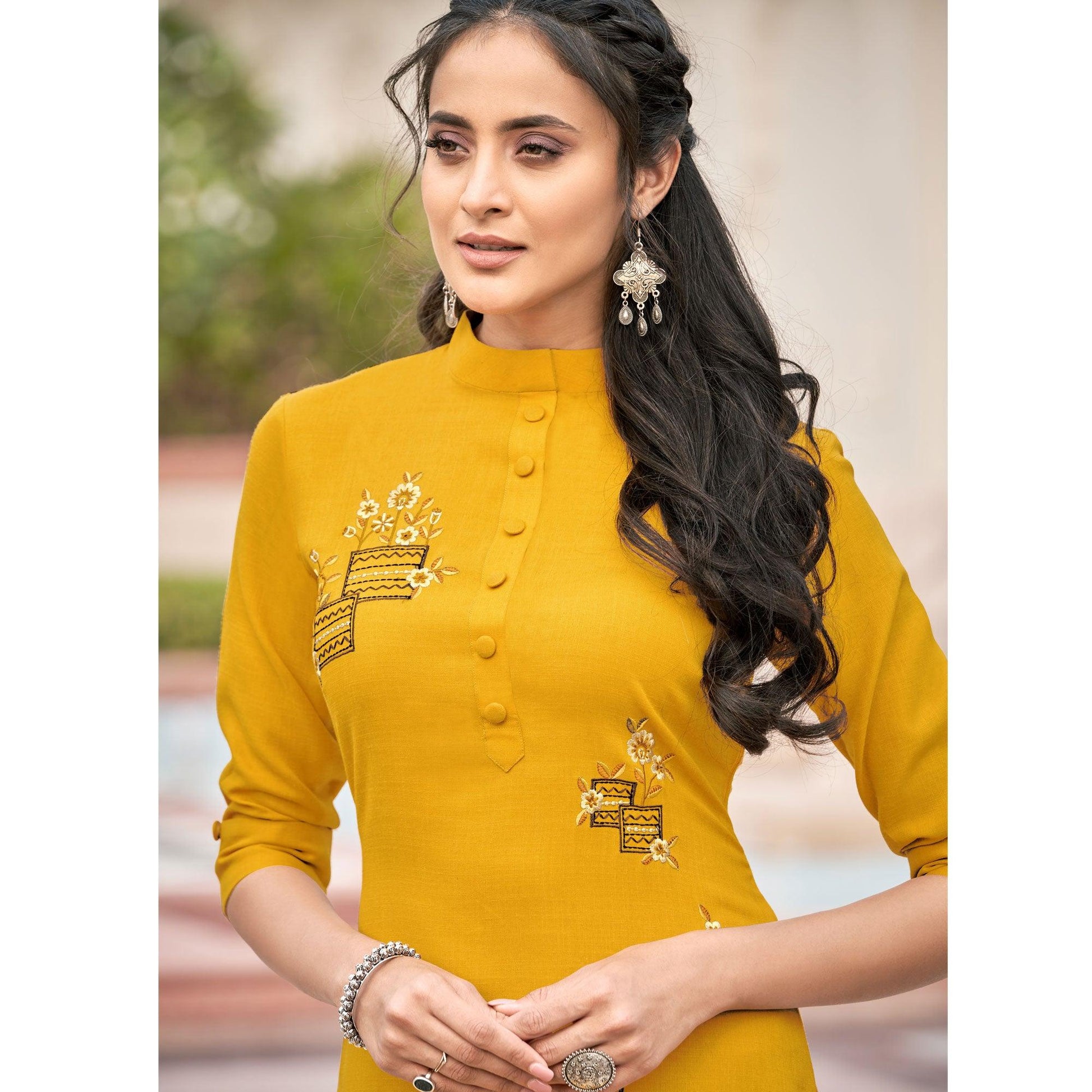 Imposing Mutard Yellow Colored Partywear Embroidered Cotton Slub Kurti Palazzo Set