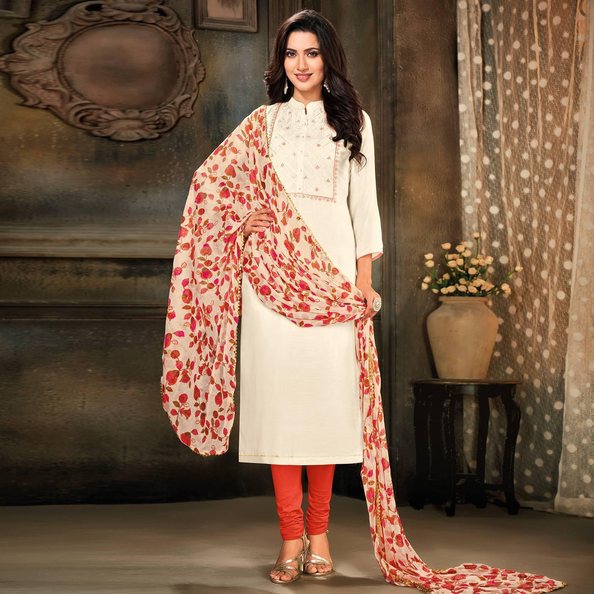Imposing Offwhite Colored Partywear Embroidered Chanderi Dress Material