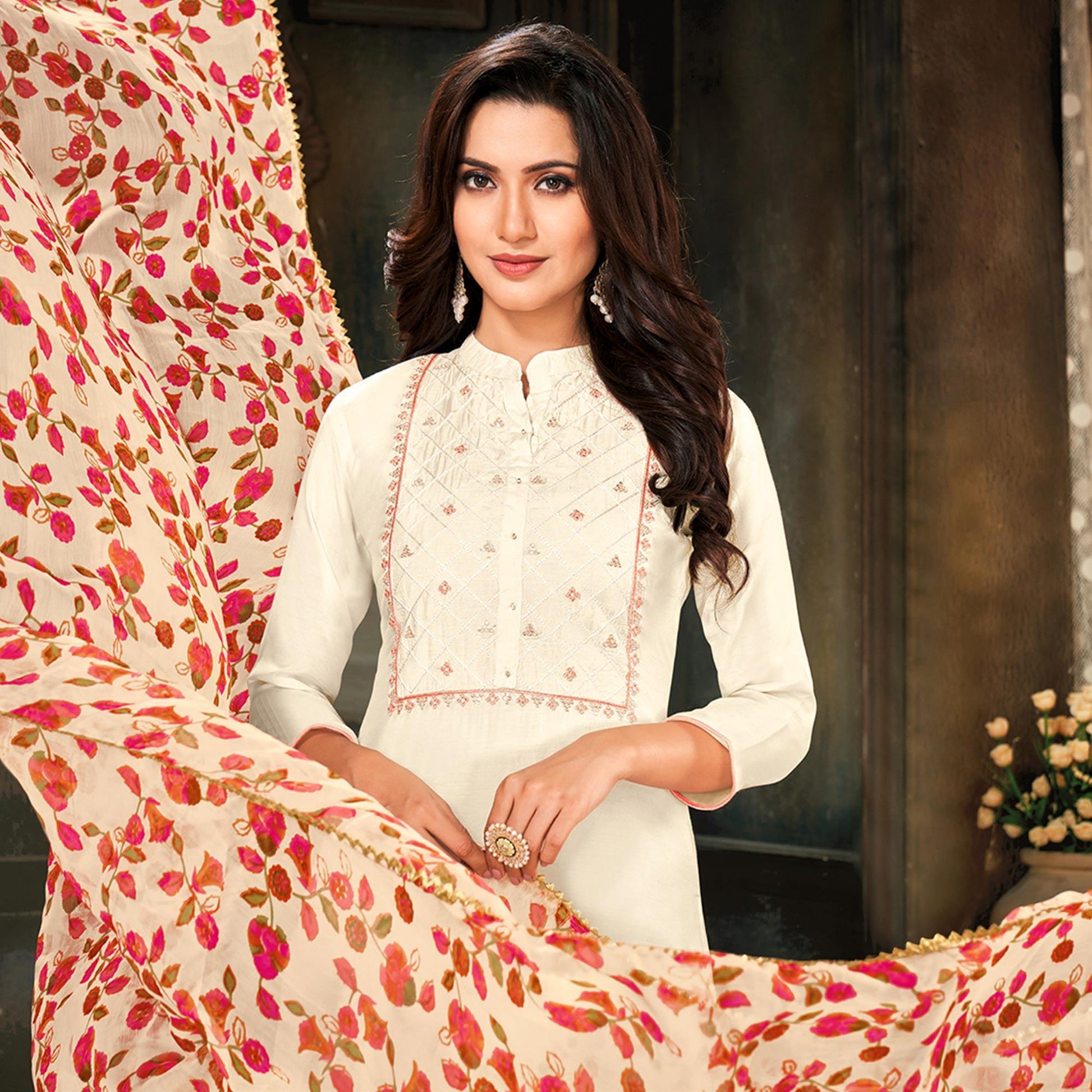 Imposing Offwhite Colored Partywear Embroidered Chanderi Dress Material
