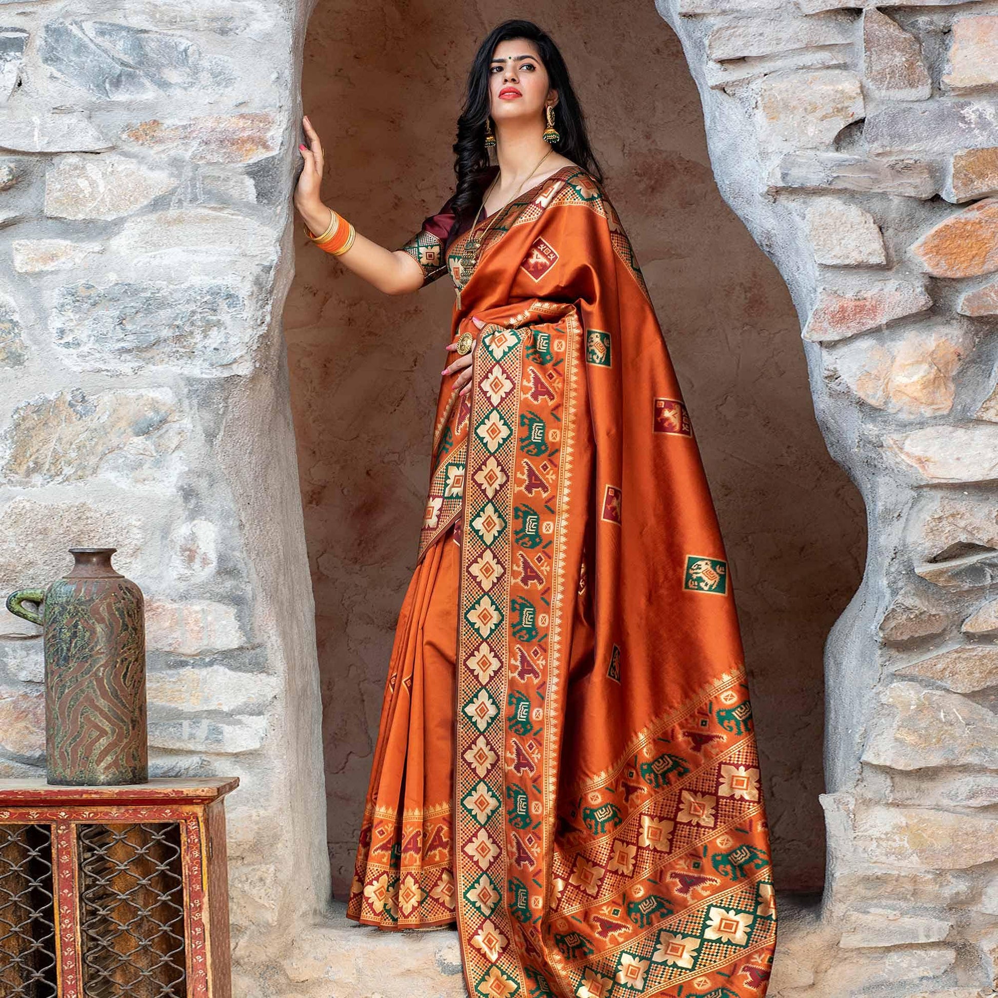 Imposing Orange Colored Festive Wear Woven Patola Silk Saree
