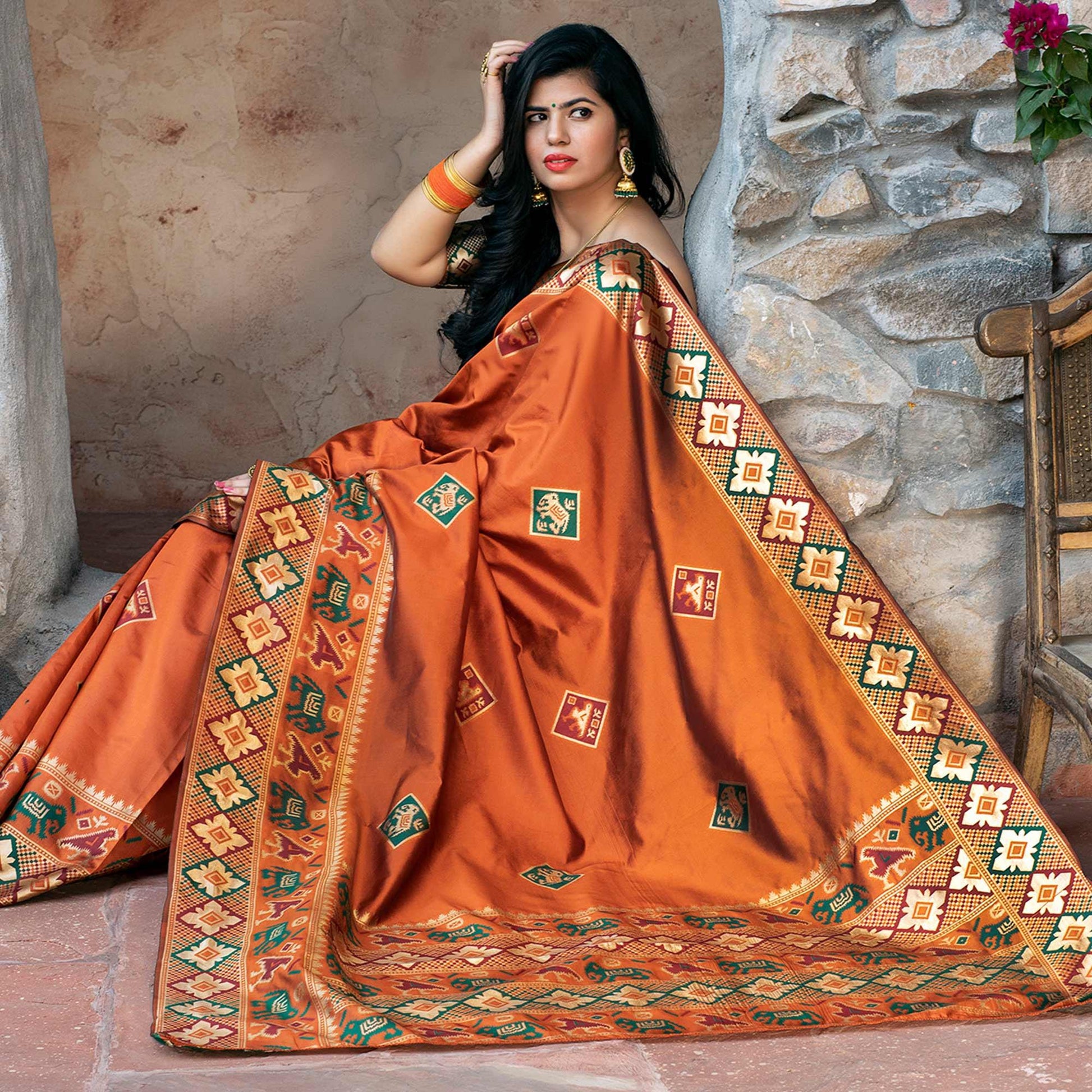 Imposing Orange Colored Festive Wear Woven Patola Silk Saree