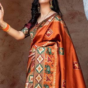 Imposing Orange Colored Festive Wear Woven Patola Silk Saree