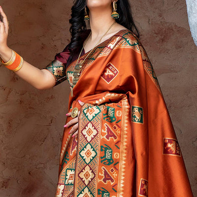 Imposing Orange Colored Festive Wear Woven Patola Silk Saree