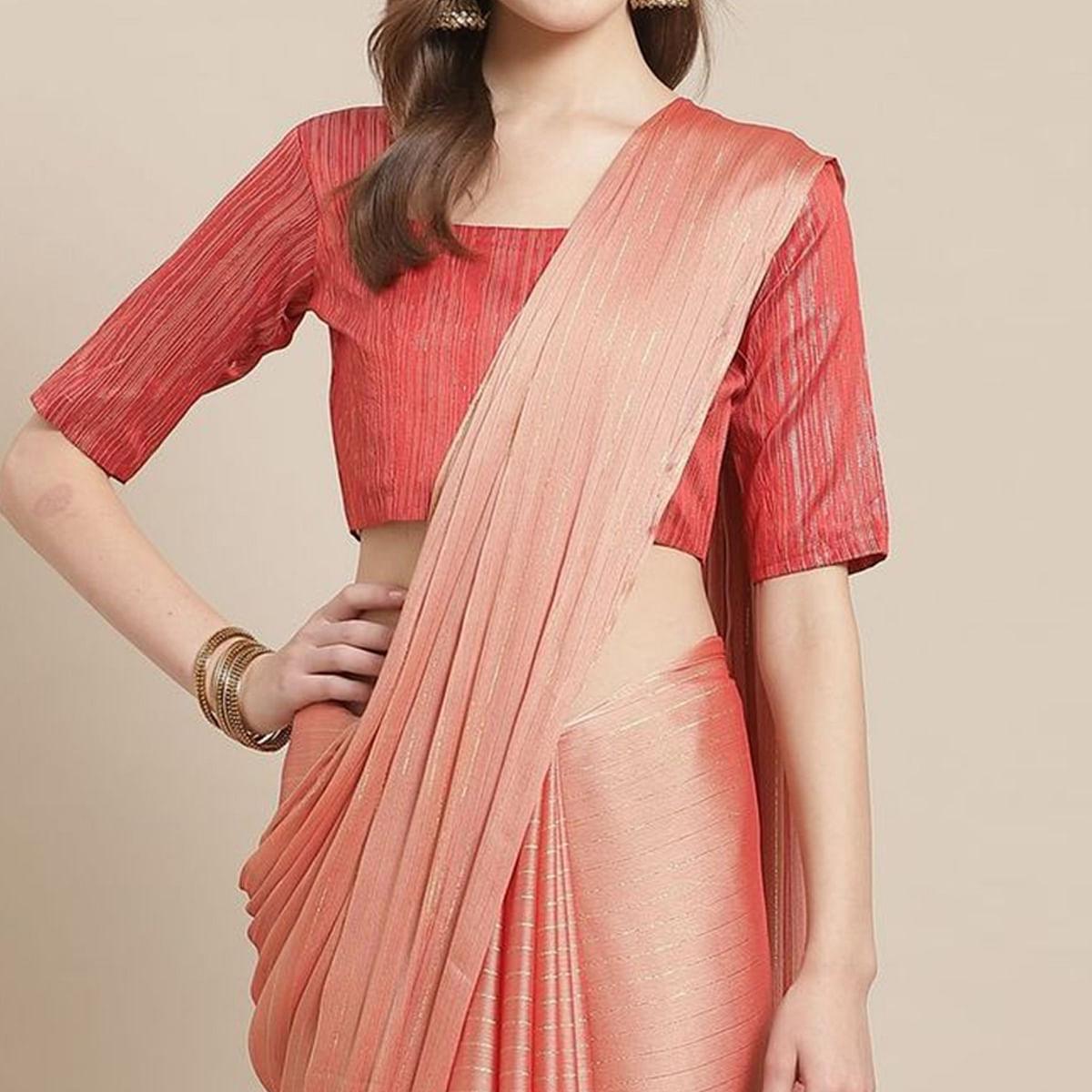 Imposing Peach Colored Casual Wear Printed Poly Georgette Saree