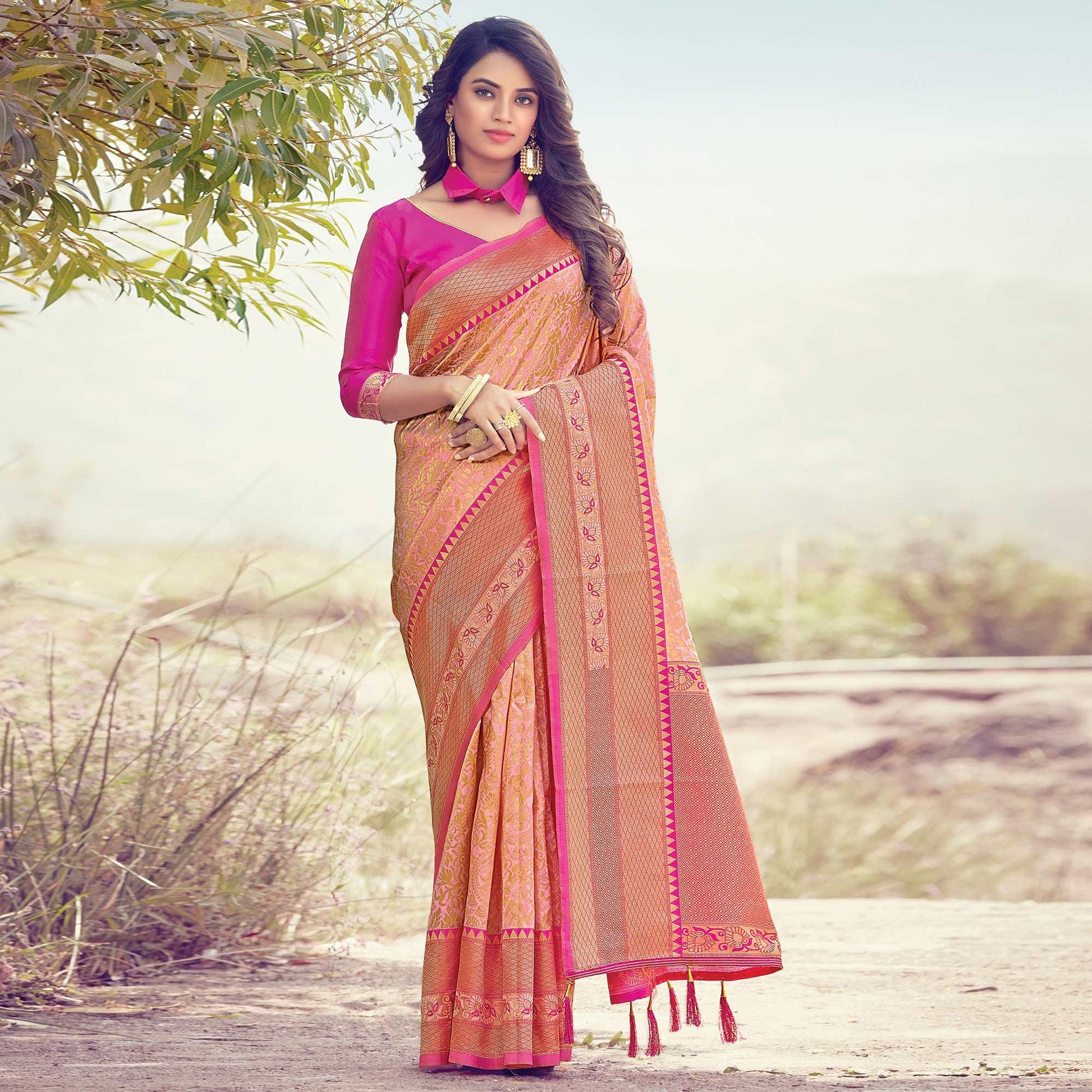 Imposing Peach Colored Festive Wear Woven Silk Saree