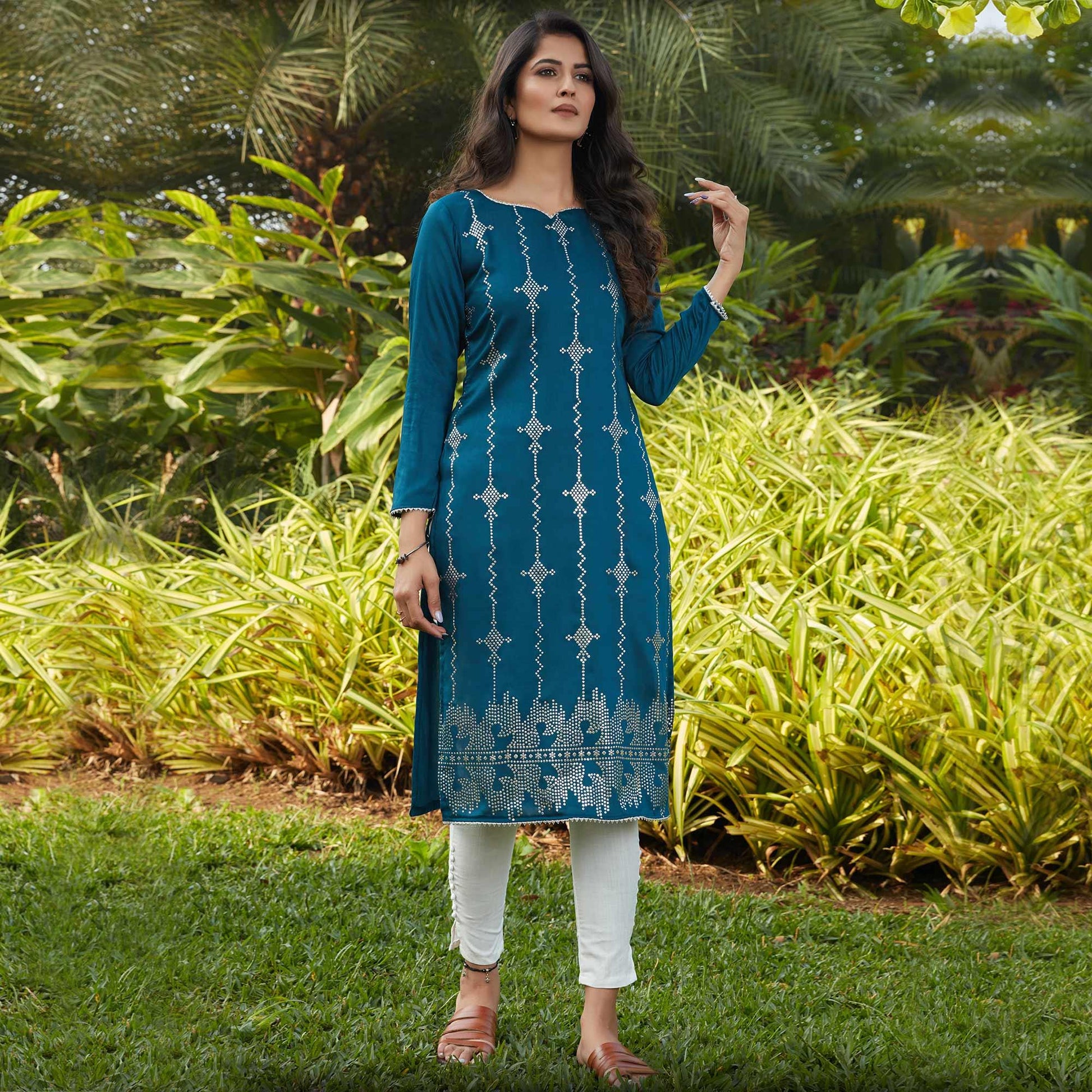 Imposing Rama Green Casual Wear Glistering Embellishment Silky Cotton Kurti