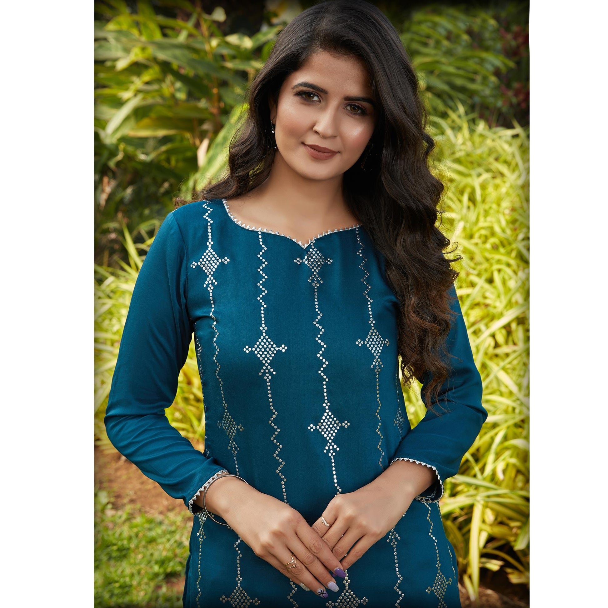 Imposing Rama Green Casual Wear Glistering Embellishment Silky Cotton Kurti