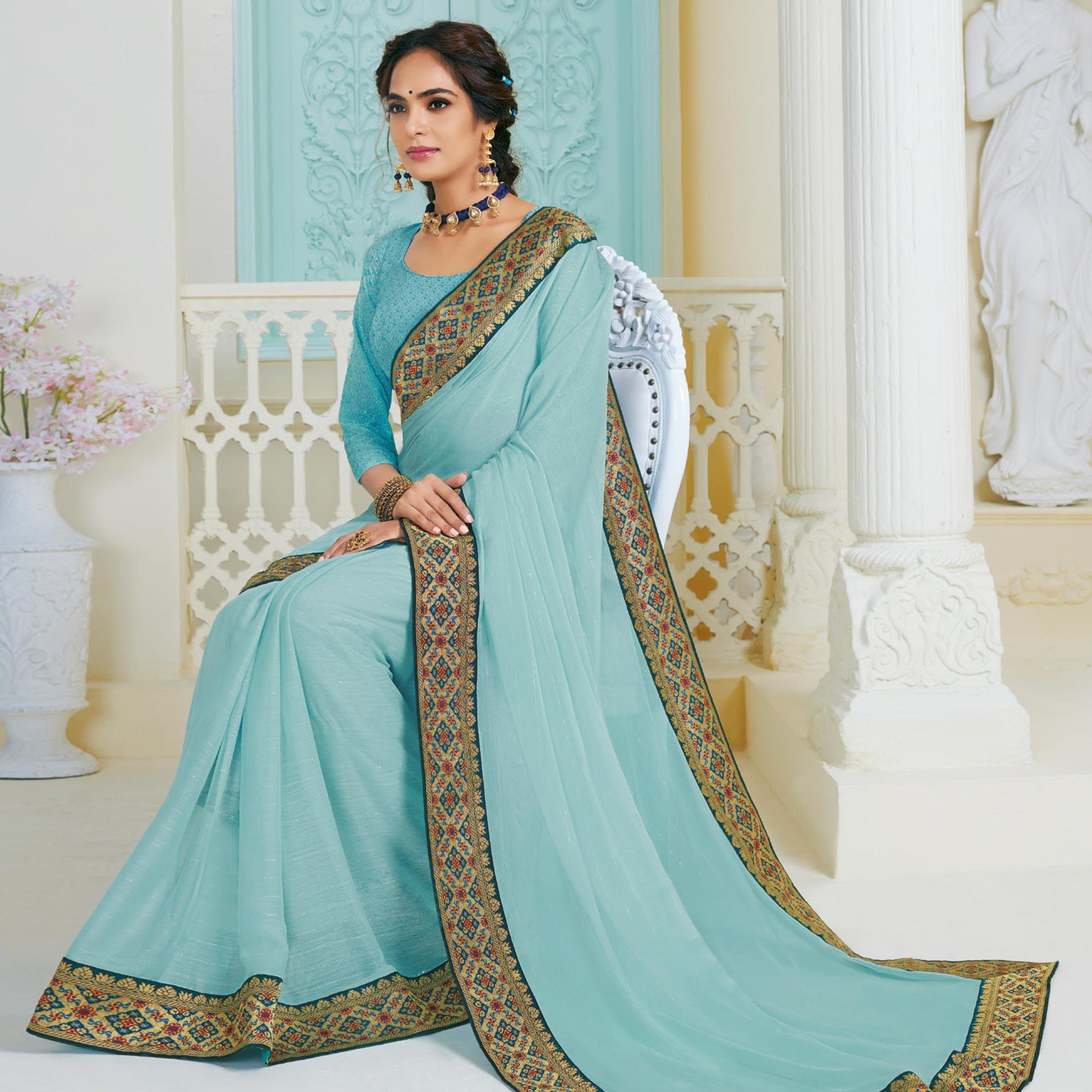 Imposing Sky Blue Colored Partywear Foil Work Chiffon Saree
