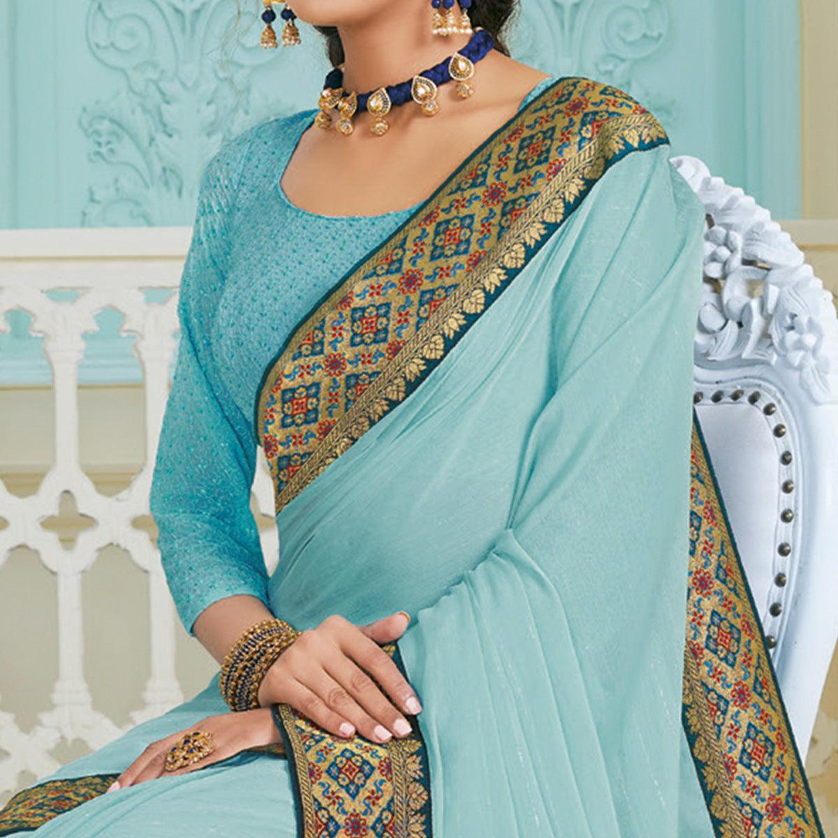 Imposing Sky Blue Colored Partywear Foil Work Chiffon Saree