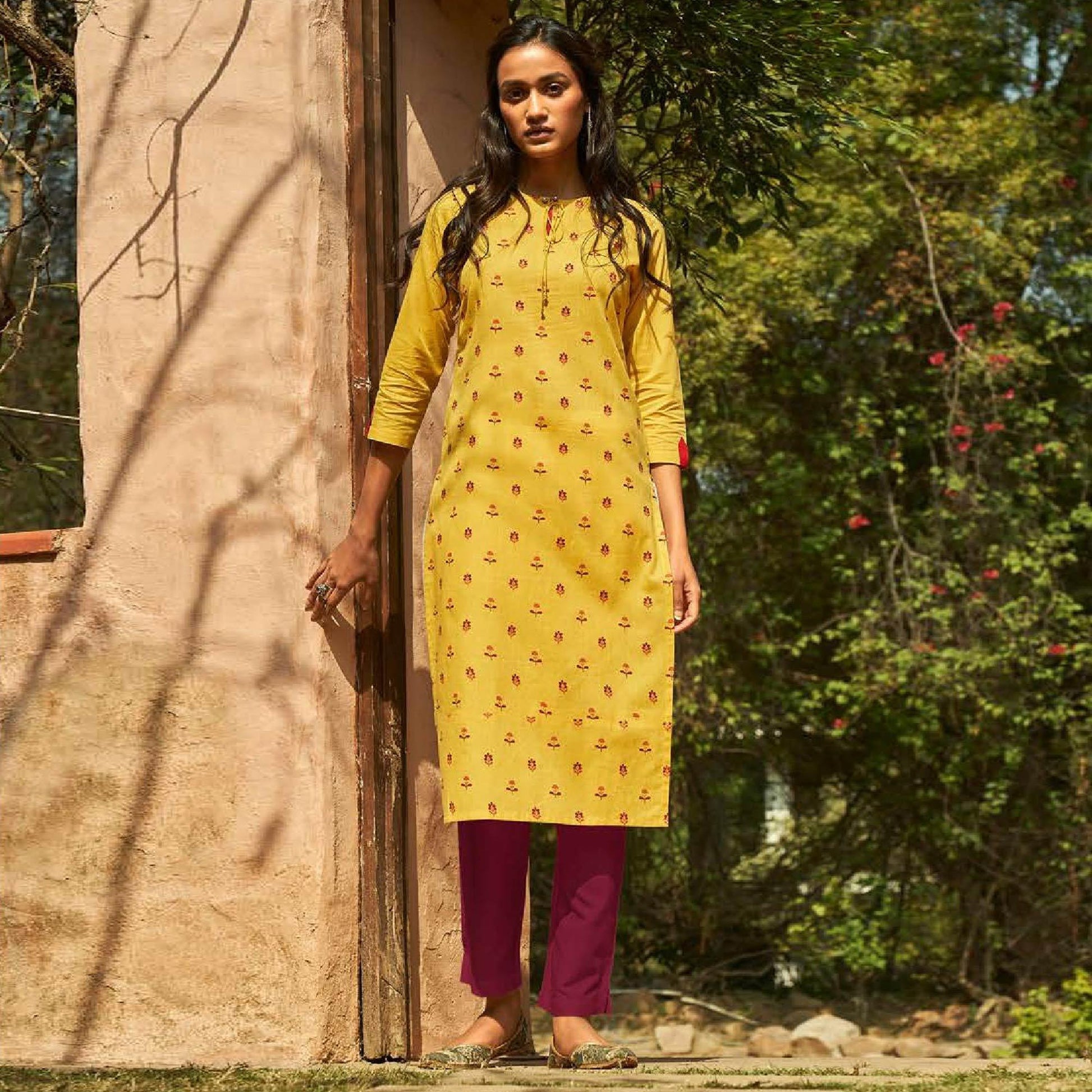 Imposing Yellow Colored Casual Wear Embroidered Cotton Kurti With Bottom