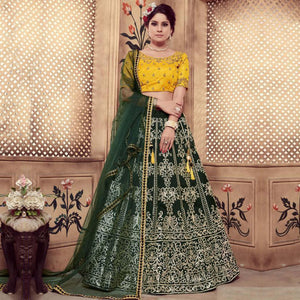 Impressive Dark Green Colored Party Wear Embroidered Silk Lehenga Choli