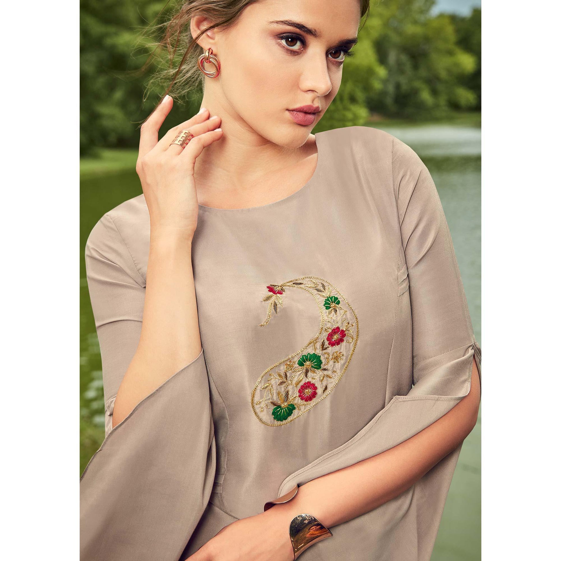 Impressive Light Grey Colored Partywear Hand Embroidered Muslin Silk Kurti-Palazzo Set