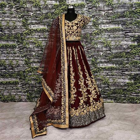 Impressive Maroon Colored Designer Partywear Raw Silk Lehenga Choli