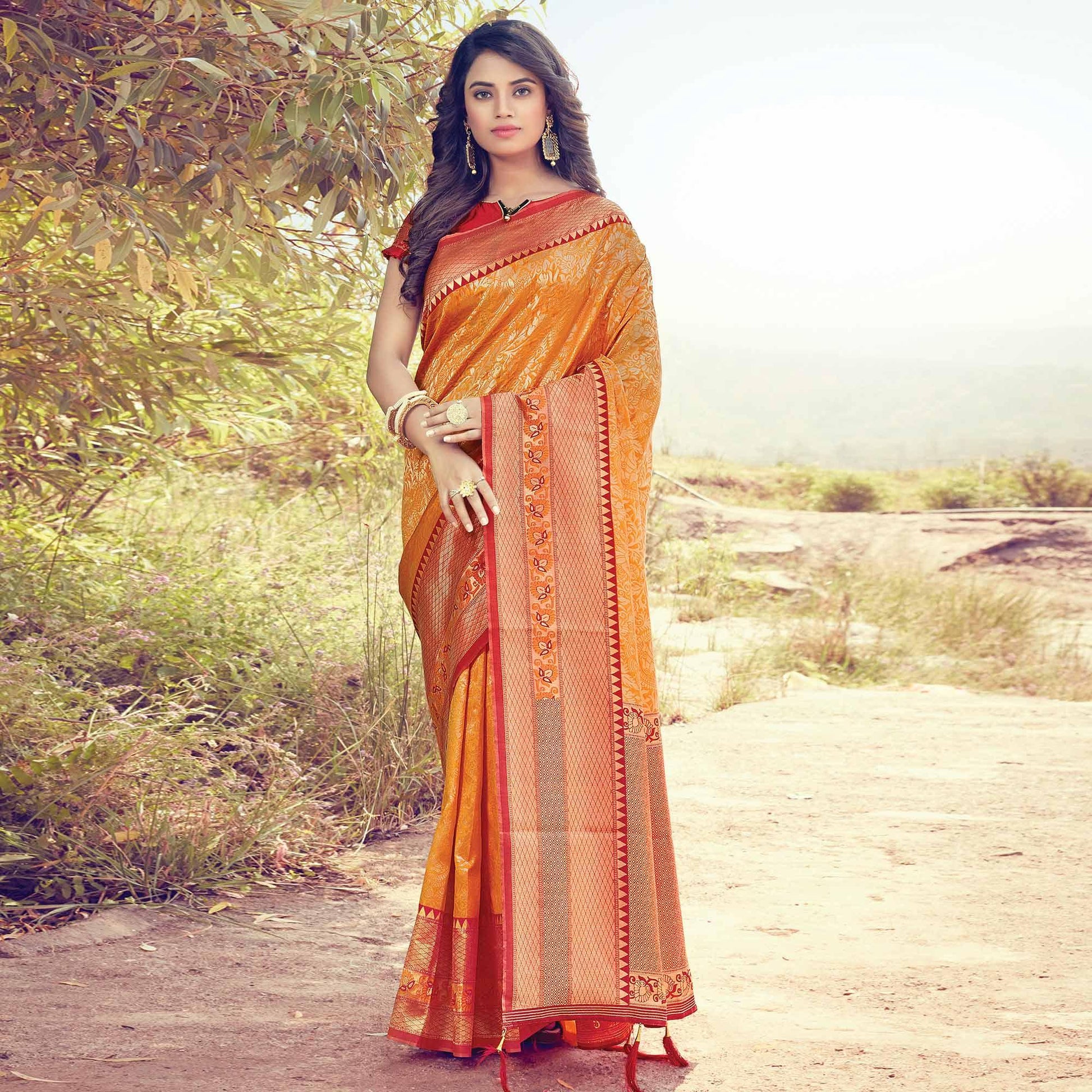 Impressive Orange Colored Festive Wear Woven Silk Saree