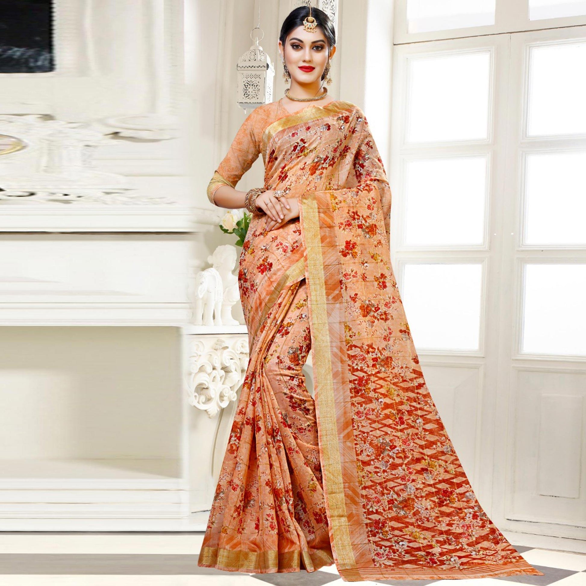 Impressive Peach Colored Casual Floral Printed Cotton Saree