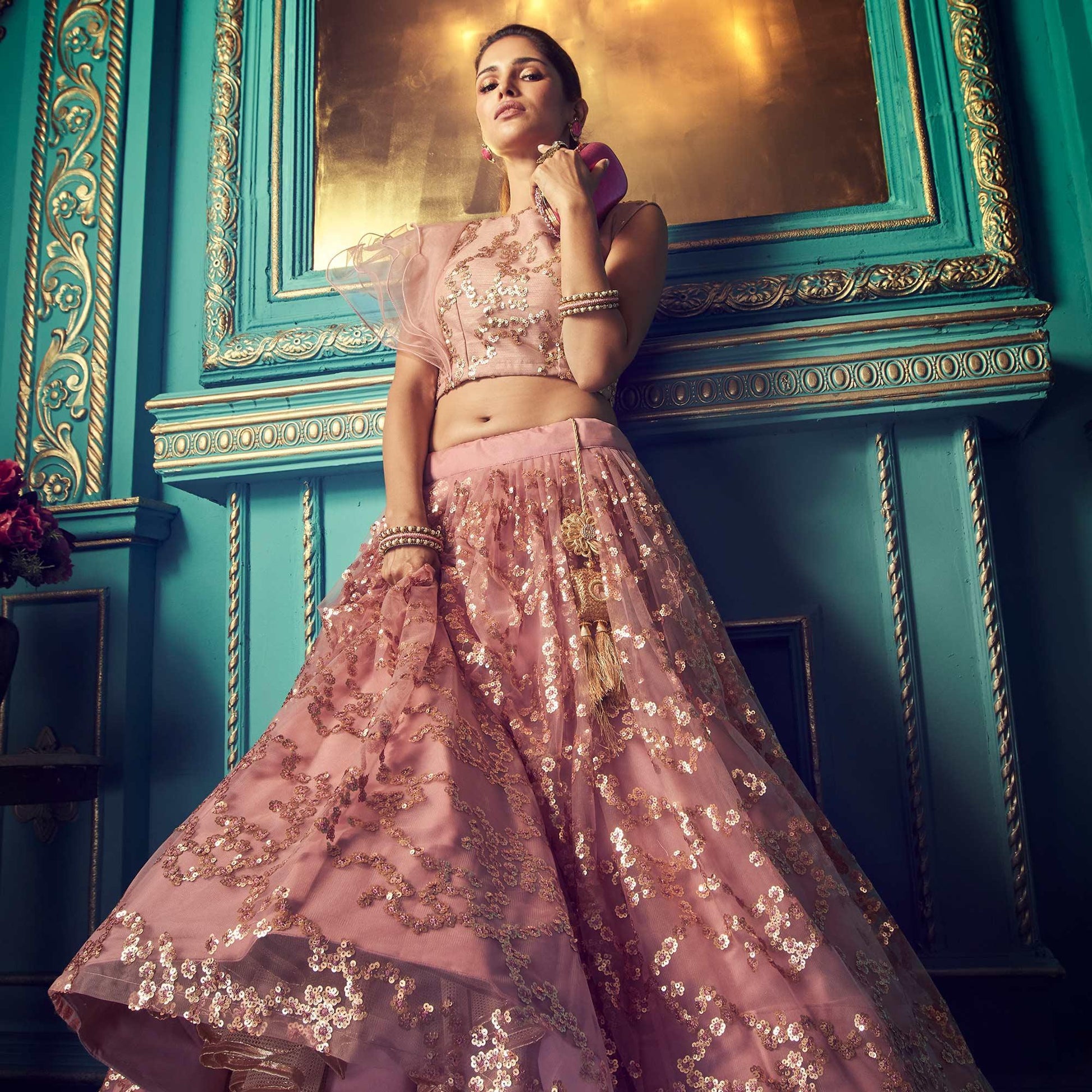 Impressive Purple Colored Partywear Embroidered Soft Net Lehenga Choli