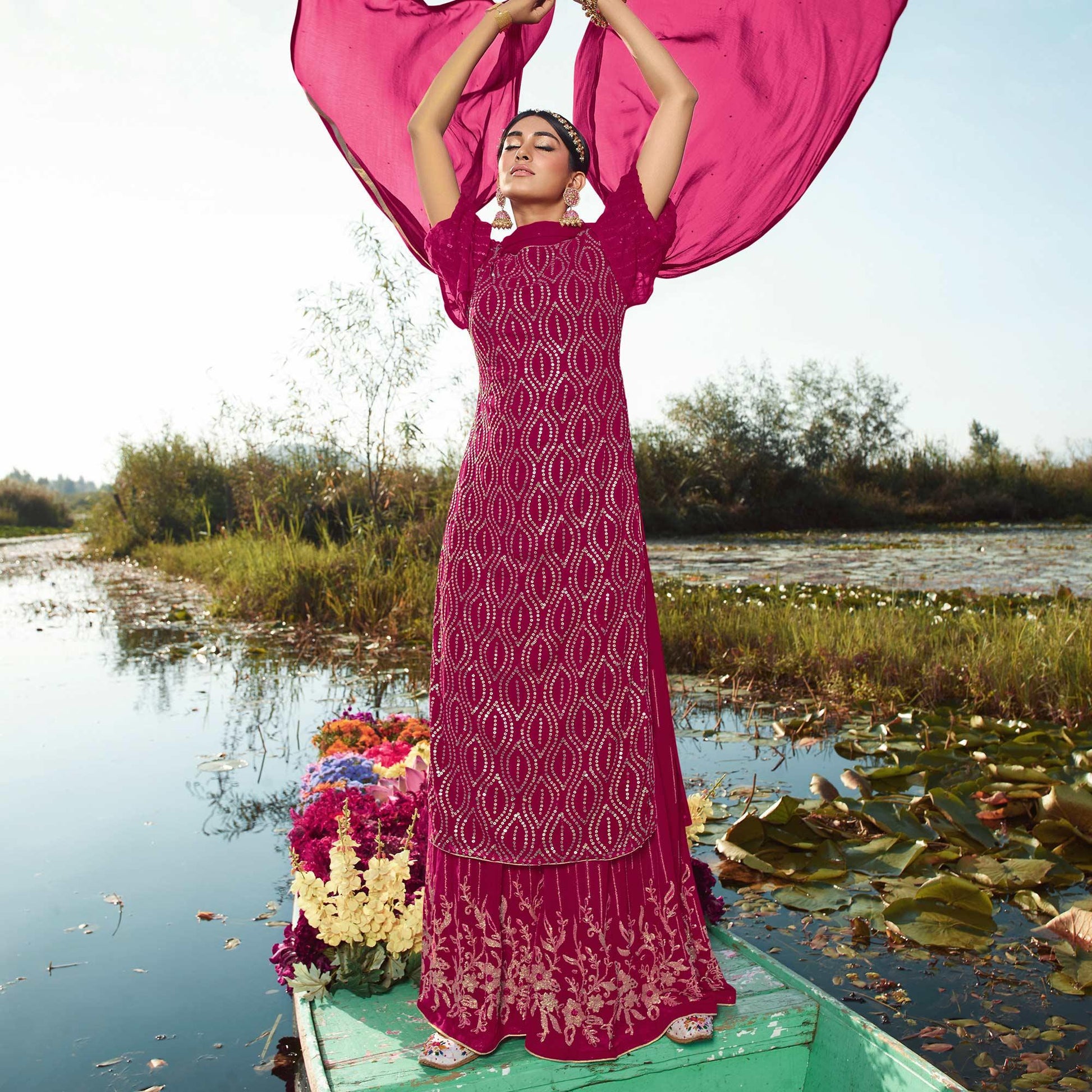 Impressive Rani Pink Colored Embroidered Partywear Heavy Georgette Suit