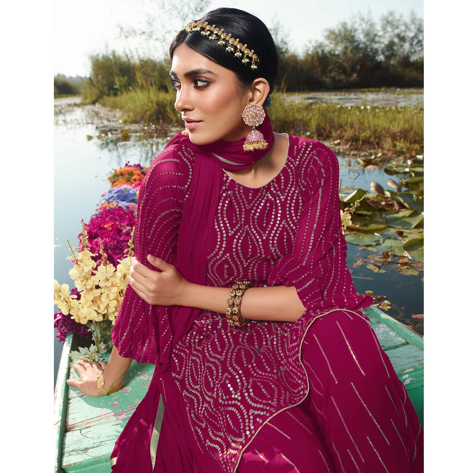 Impressive Rani Pink Colored Embroidered Partywear Heavy Georgette Suit