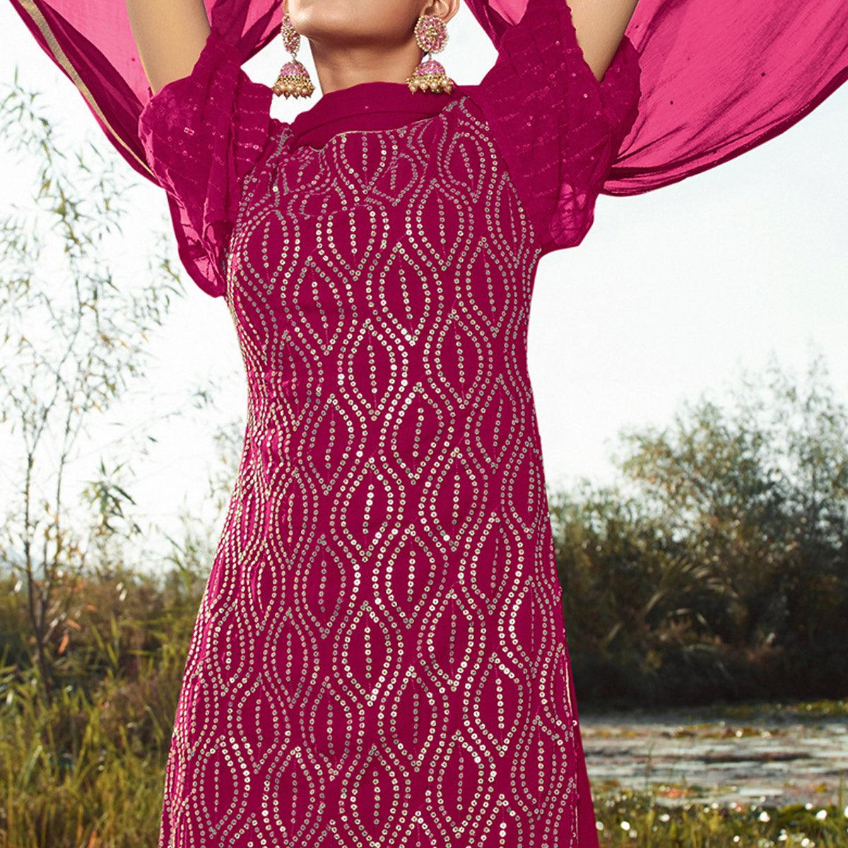 Impressive Rani Pink Colored Embroidered Partywear Heavy Georgette Suit