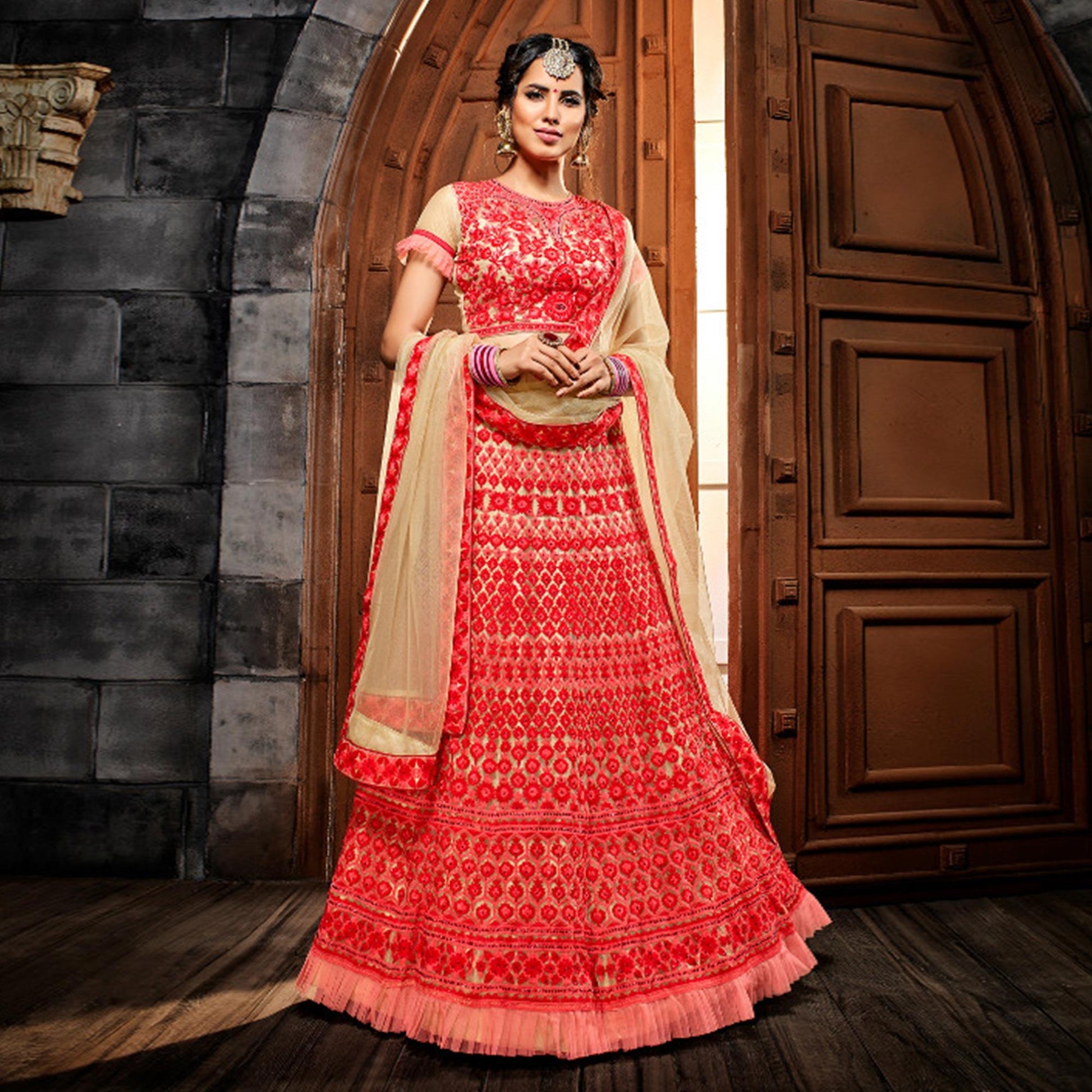 Impressive Red Colored Wedding Wear Heavy Embroidered Heavy Net Lehenga