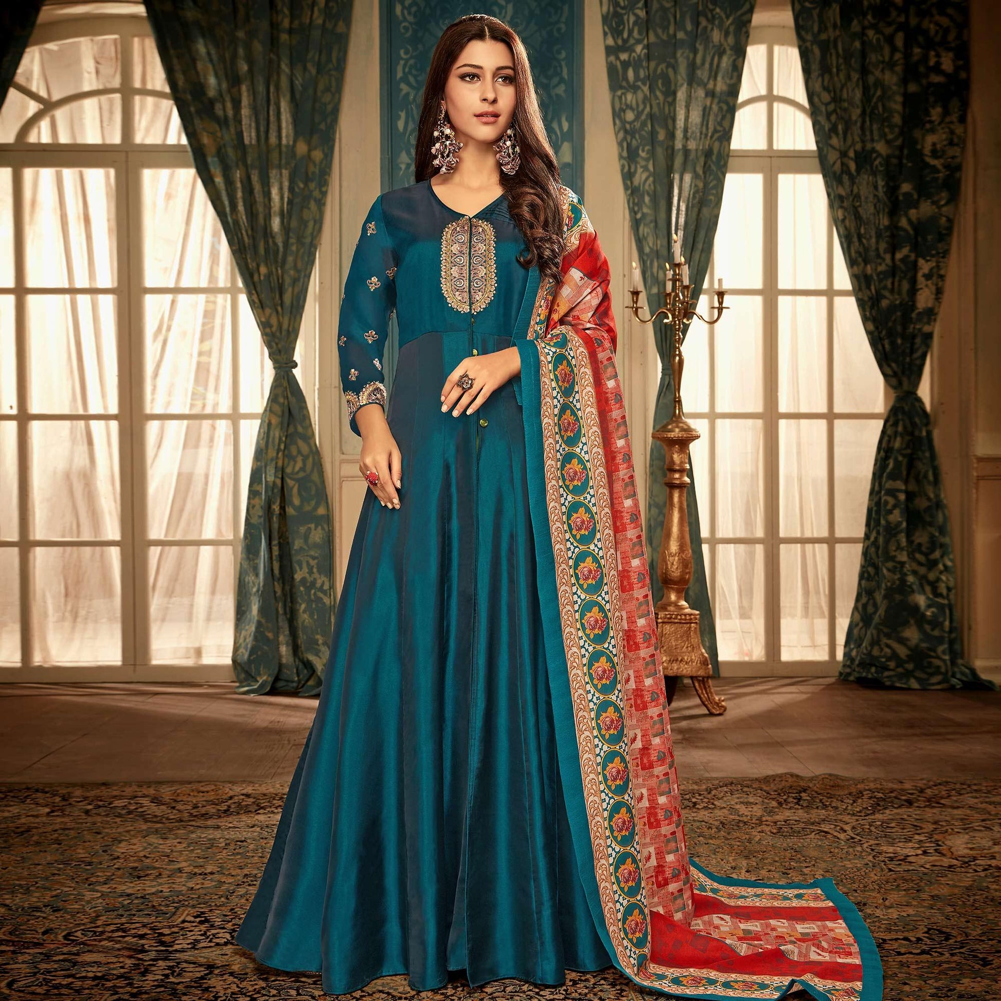 Impressive Teal Blue Colored Partywear Embroidered Heavy Muslin Gown