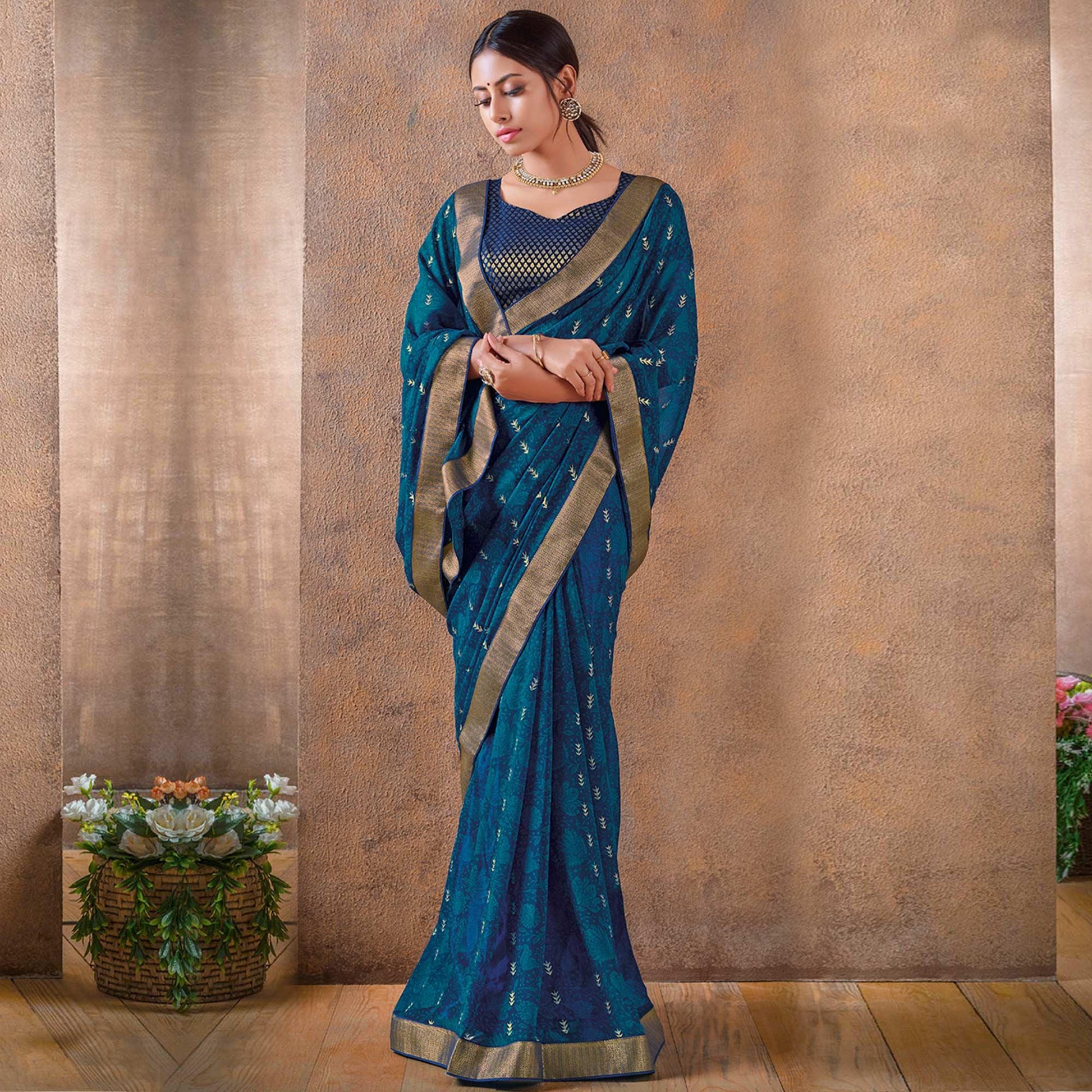 Innovative Blue Colored Festive Wear Foil Printed Georgette Saree