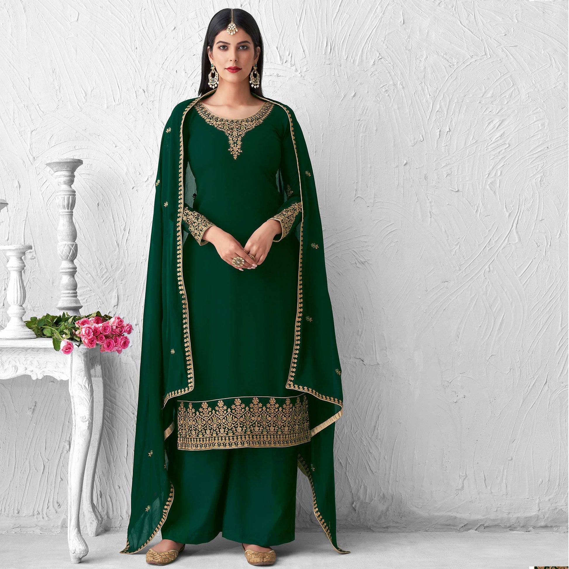 Innovative Green Colored Partywear Designer Embroidery Heavy real georgette Salwar Suit