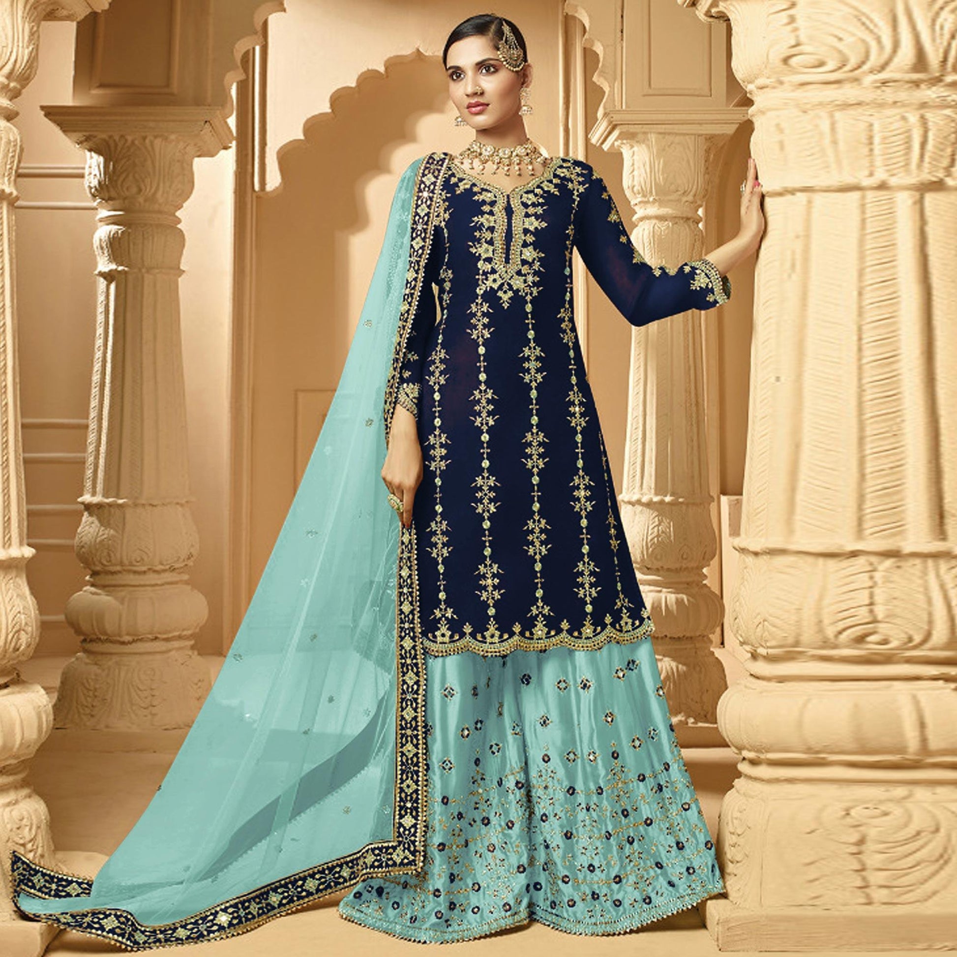Innovative Navy Blue Colored Partywear Embroidered Faux Georgette Palazzo suit