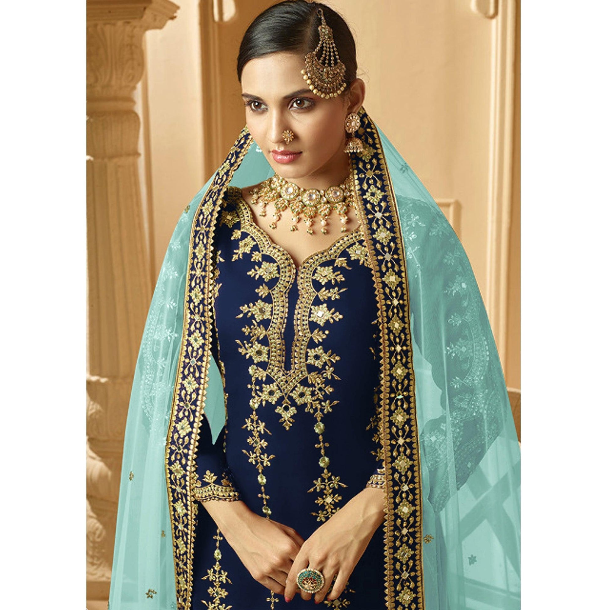 Innovative Navy Blue Colored Partywear Embroidered Faux Georgette Palazzo suit