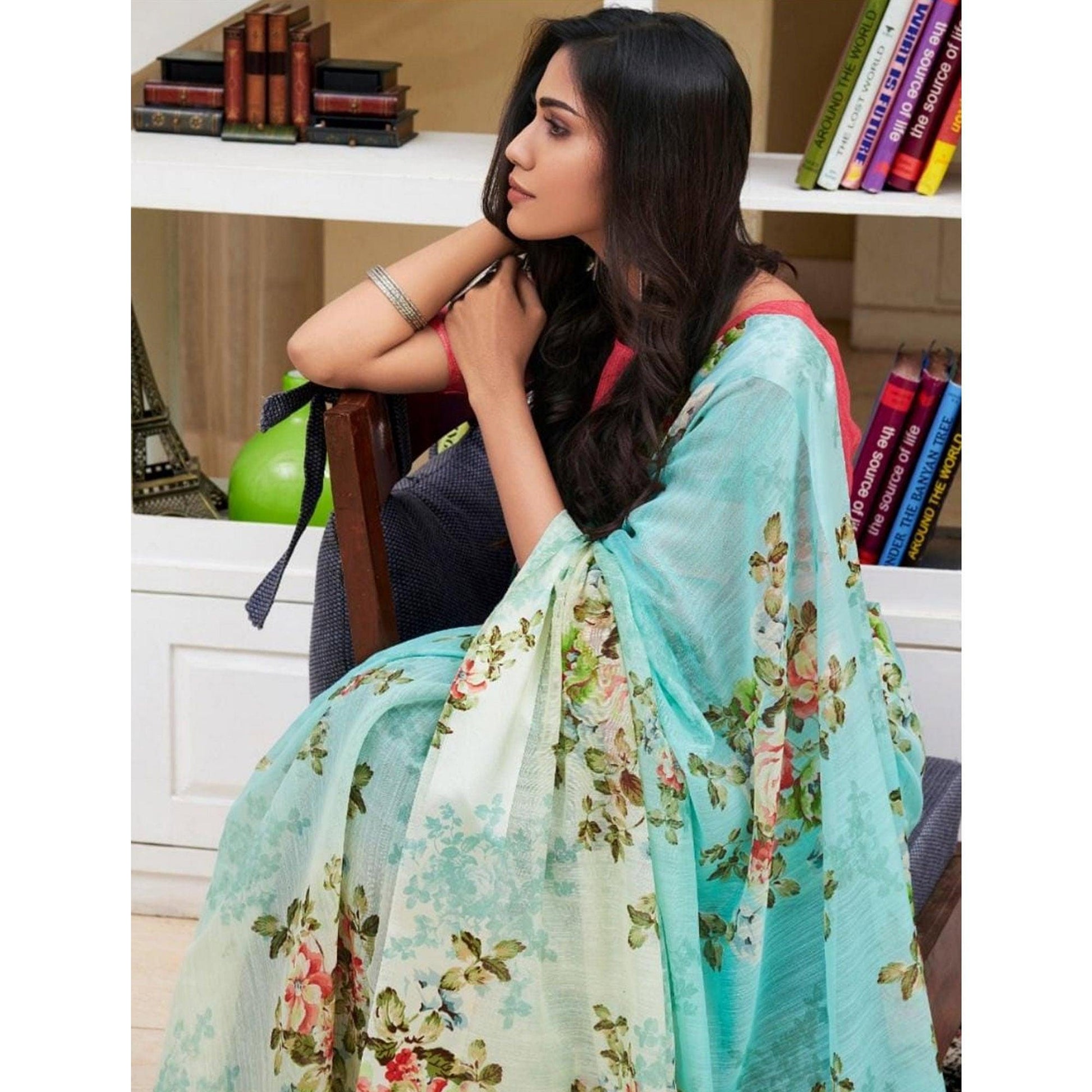 Intricate Aqua Blue Colored Casual Wear Floral Printed Linen Saree