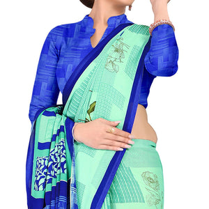 Intricate Aqua Green Colored Casual Wear Printed Georgette Saree