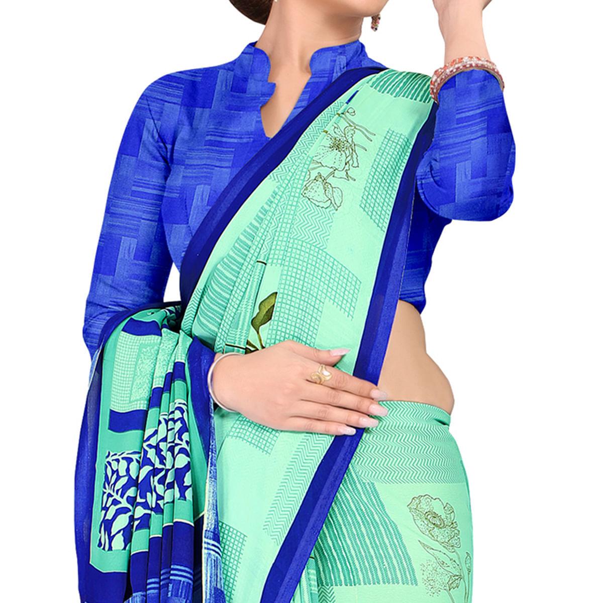 Intricate Aqua Green Colored Casual Wear Printed Georgette Saree