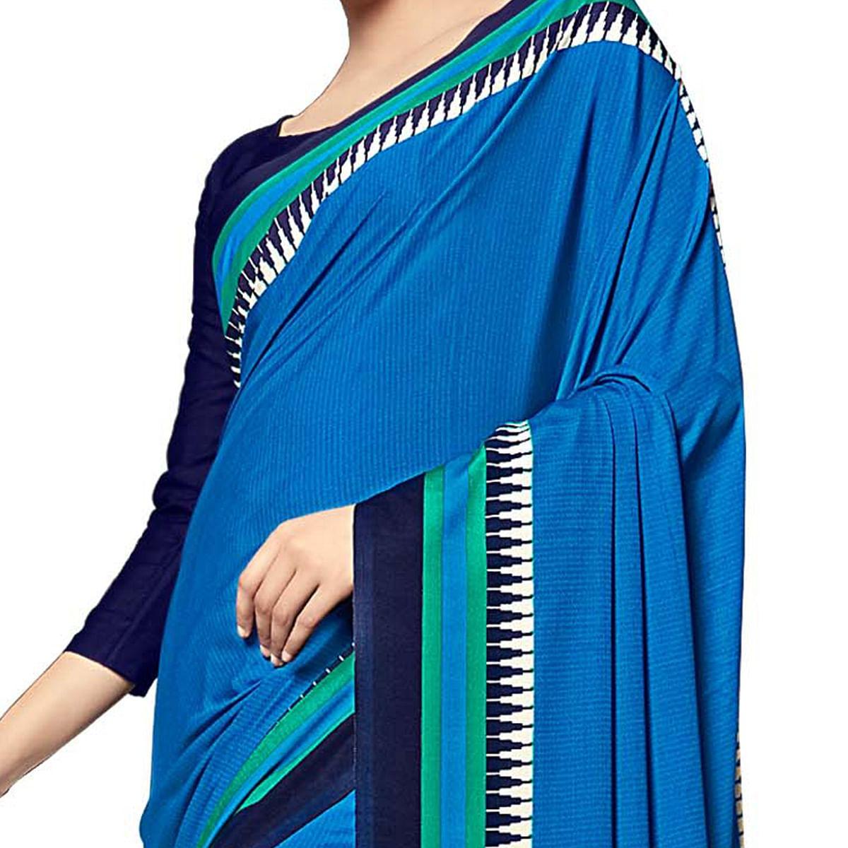 Intricate Blue Colored Casual Wear Printed Crepe Saree