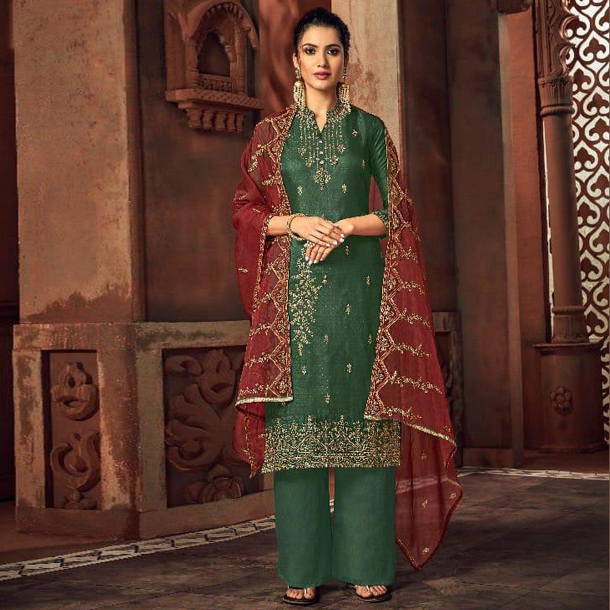 Intricate Green Colored Party Wear Embroidered Silk Palazzo Suit
