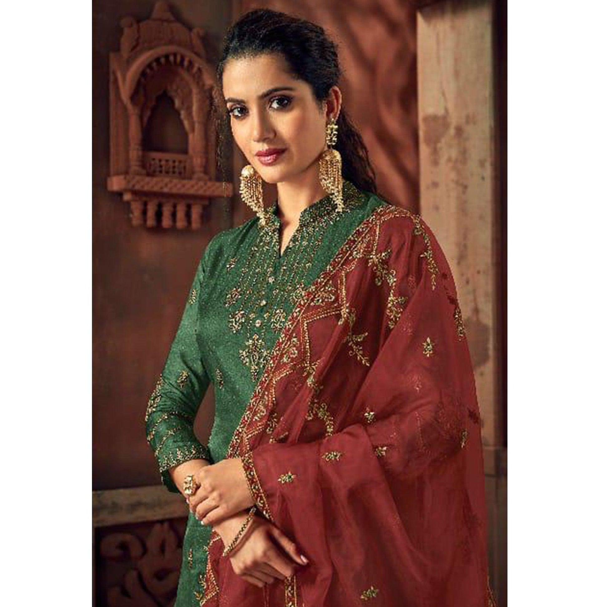 Intricate Green Colored Party Wear Embroidered Silk Palazzo Suit