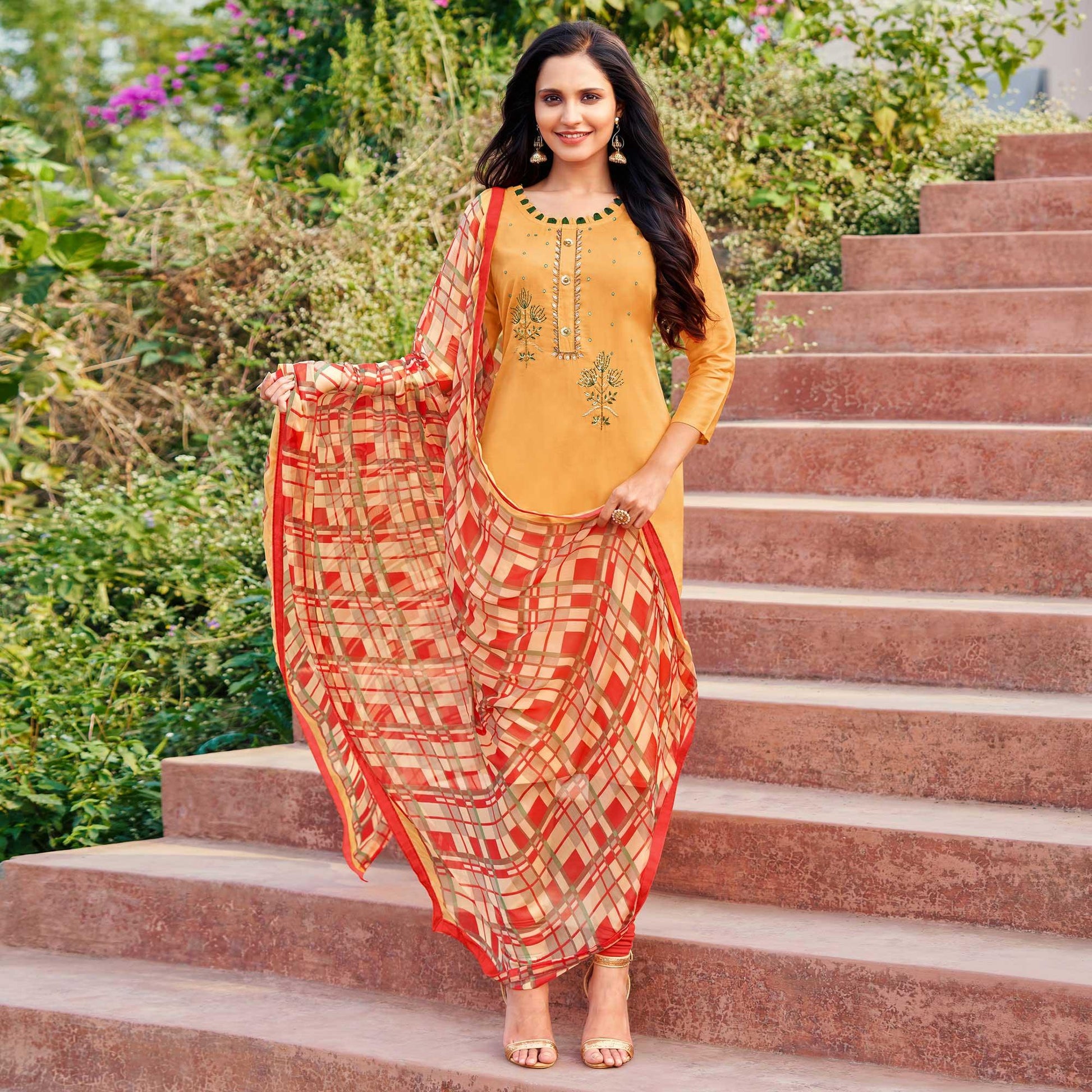 Intricate Light Orange Colored Partywear Embroidered Modal Cotton Dress Material