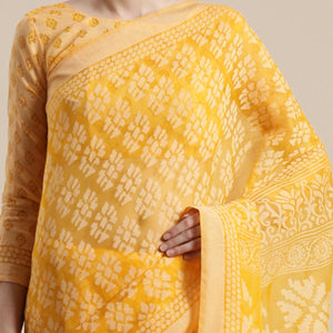 Intricate Orange Colored Party Wear Geometric Brasso Saree