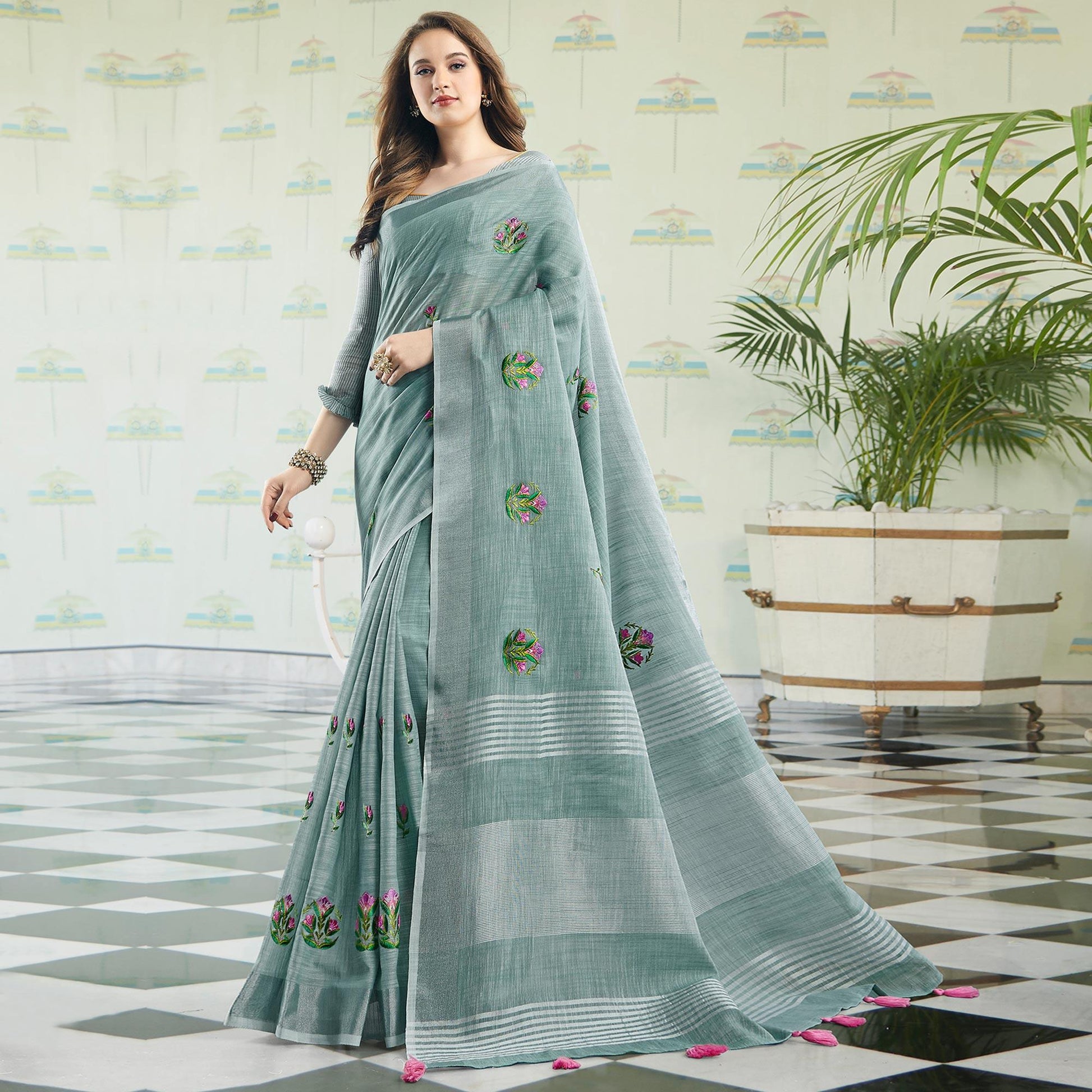 Intricate Pastel Blue Colored Casual Wear Floral Embroidered Linen-Cotton Saree With Tassels