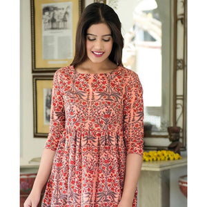 Intricate Peach Colored Casual Printed Muslin Blend Gown