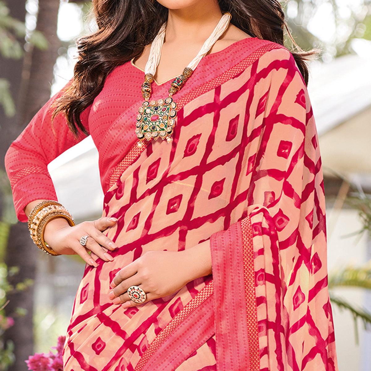 Intricate Peach Colored Partywear Printed Georgette Saree