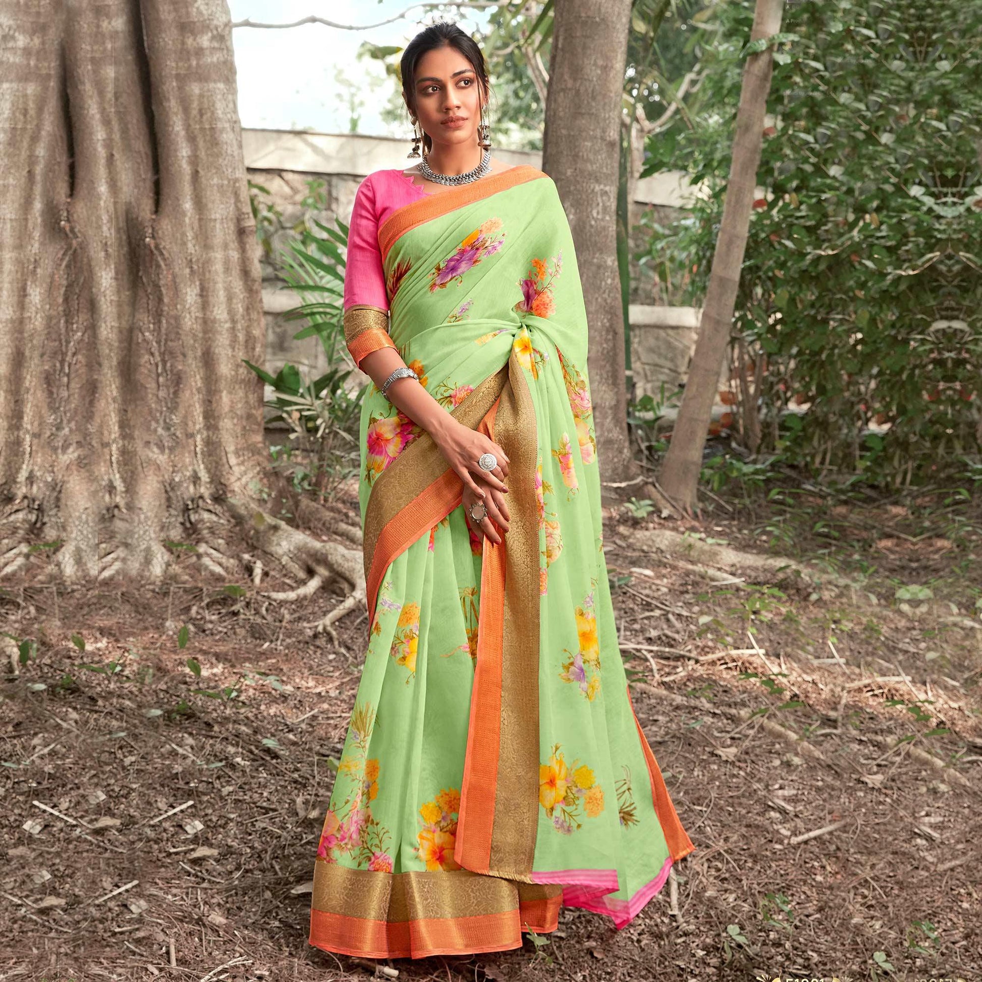 Intricate Pista Green Colored Partywear Floral Printed Linen Silk Saree