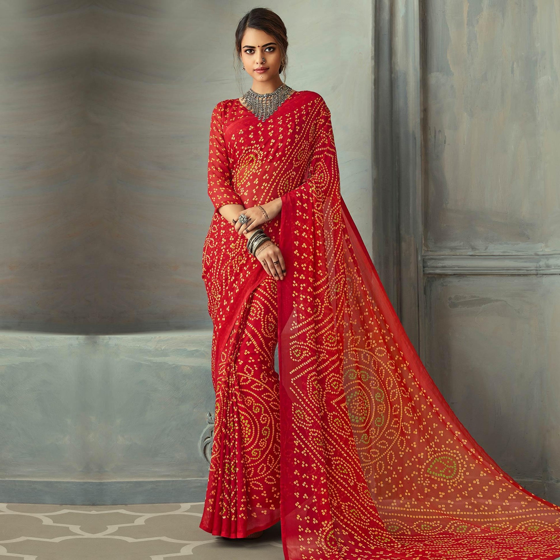 Intricate Red Colored Casual Wear Bandhani Printed Chiffon Saree