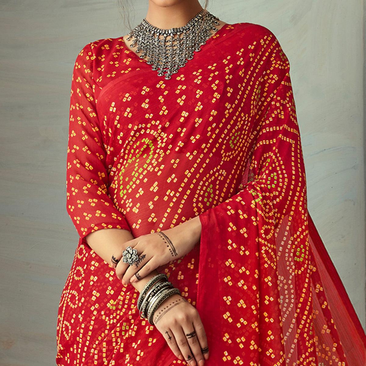 Intricate Red Colored Casual Wear Bandhani Printed Chiffon Saree