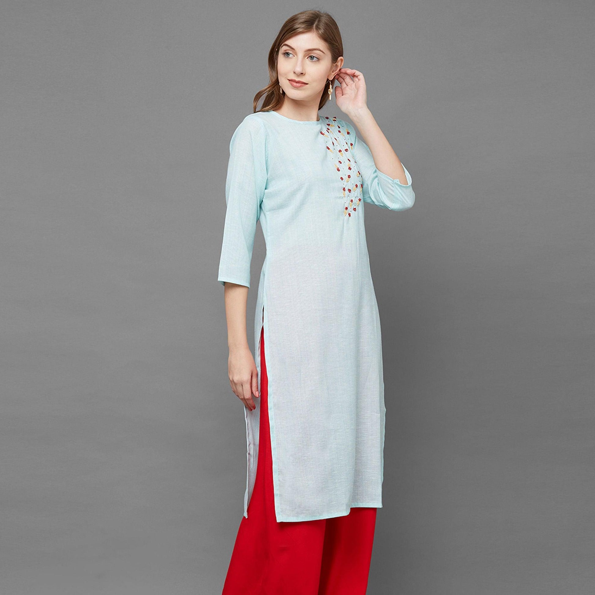 Intricate Sky Blue Colored Casual Hand Embroidered Cotton Kurti