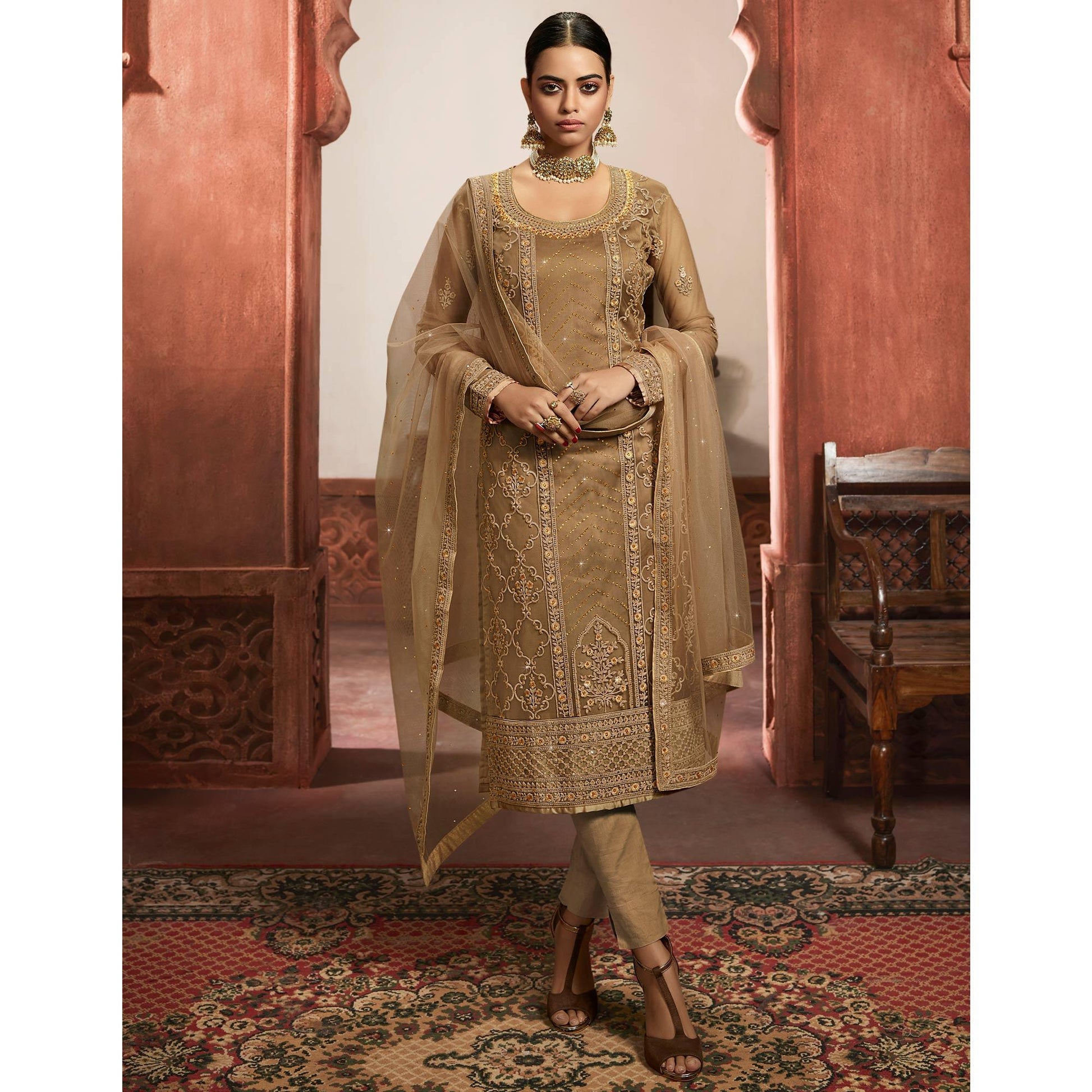 Jazzy Beige Coloured Partywear Embroidered Super Net Sharara Style Salwar Suit